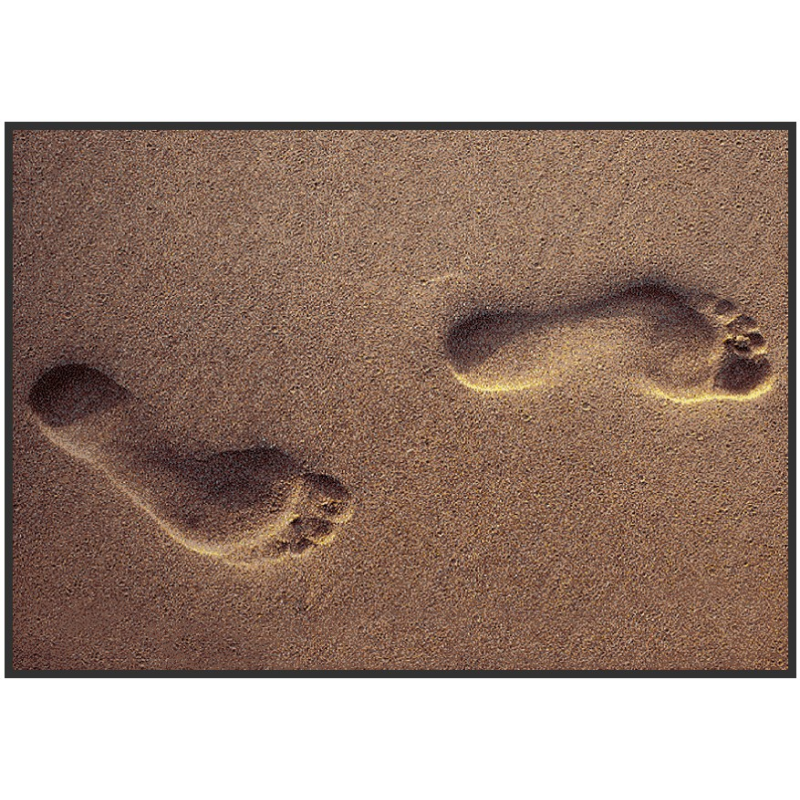 tapis d'entrée pied sur le sable,
