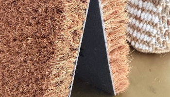 Tapis à poser ou à encastrer : pourquoi des finitions de bords différentes ?